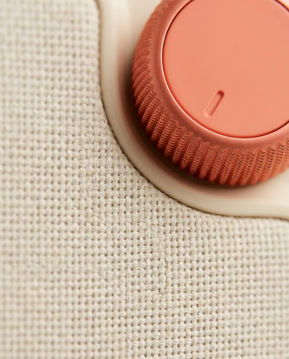 Close-up of the coral dial